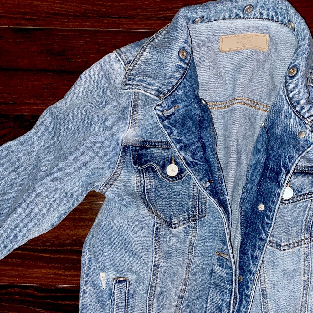 Distressed jean jacket